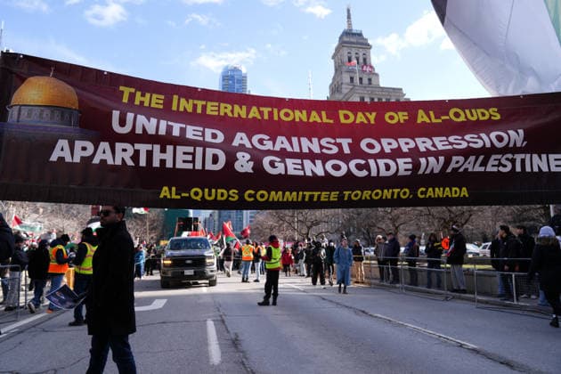 Al-Quds Day Rally in Toronto TORONTO, CANADA - MARCH 14 : People take part in a Al-Quds Day rally in Toronto, Ontario, Canada on March 14, 2026. Demonstrators carrying Palestinian and Iranian flags gathered near US Consulate General to protest Israel and the United States attacks on Iran and Lebanon, and marched in downtown Toronto. Mert Alper Dervis Anadolu Toronto Canada. Editorial use only. Please get in touch for any other usage.  Copyright: x2026xAnadoluxMertxAlperxDervisx