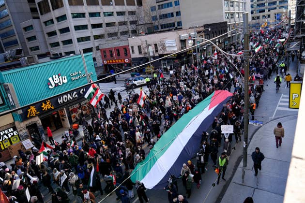 Al-Quds Day Rally in Toronto TORONTO, CANADA - MARCH 14 : People take part in a Al-Quds Day rally in Toronto, Ontario, Canada on March 14, 2026. Demonstrators carrying Palestinian and Iranian flags gathered near US Consulate General to protest Israel and the United States attacks on Iran and Lebanon, and marched in downtown Toronto. Mert Alper Dervis Anadolu Toronto Canada. Editorial use only. Please get in touch for any other usage.  Copyright: x2026xAnadoluxMertxAlperxDervisx