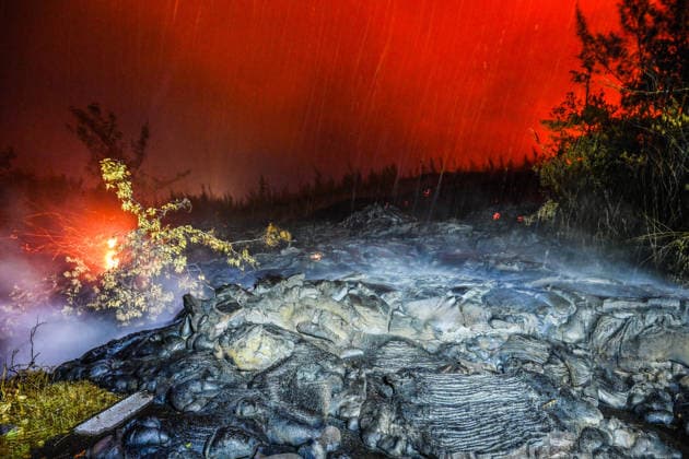 Le volcan de La Reunion est entre en eruption fin fevrier il poursuit sa descente sur l ocean Le front de lave poursuit son chemin vers la mer ce vendredi 12 mars 2026 et a commencé a traverser la route nationale 2 dans la region du Grand Brule The Piton de la Fournaise volcano on Réunion Island erupted at the end of February and continues its descent into the ocean The lava front continued its path towards the sea on Friday, March 12, 2026, and began crossing National Route 2 in the Grand Brule region 454075 2026 03 15 Ile de la Reunion France sans perso  Copyright: xPierrexMarchalx xAnakaoPressx xStarfacex STAR_454075_034