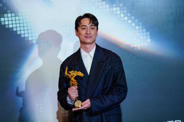 HONGKONG-ENT ASIA-FILM-AWARDS Hong Kong Actor Terrance Lau Chun-him, holing a trophy posing for a photo at the Asian Film Awards in Hong Kong, March 15, 2026. NEXPHER Vernon Yuen HONG KONG