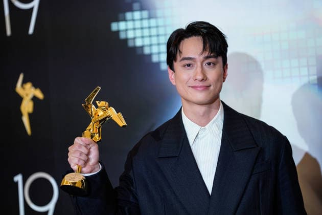 HONGKONG-ENT ASIA-FILM-AWARDS Hong Kong Actor Terrance Lau Chun-him, holing a trophy posing for a photo at the Asian Film Awards in Hong Kong, March 15, 2026. NEXPHER Vernon Yuen HONG KONG
