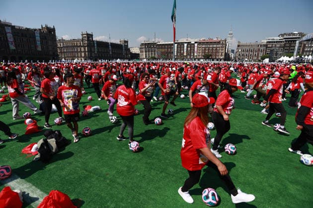 Mexico City attempts to break Guinness World Record for largest football lesson MEXICO CITY, MEXICO - MARCH 15: Participants take part in a football lesson during an attempt to break the Guinness World Record for the world s largest football (soccer) lesson, at Zocalo square, in Mexico City, Mexico on March 15, 2026. Thousands of people gathered to take part in the attempt to break the record in a soccer lesson organized by the Mexico City government as part of activities ahead of the 2026 FIFA World Cup. Daniel Cardenas Anadolu Mexico City Mexico. Editorial use only. Please get in touch for any other usage.  Copyright: x2026xAnadoluxDanielxCardenasx