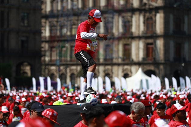 Mexico City attempts to break Guinness World Record for largest football lesson MEXICO CITY, MEXICO - MARCH 15: Participants take part in a football lesson during an attempt to break the Guinness World Record for the world s largest football (soccer) lesson, at Zocalo square, in Mexico City, Mexico on March 15, 2026. Thousands of people gathered to take part in the attempt to break the record in a soccer lesson organized by the Mexico City government as part of activities ahead of the 2026 FIFA World Cup. Daniel Cardenas Anadolu Mexico City Mexico. Editorial use only. Please get in touch for any other usage.  Copyright: x2026xAnadoluxDanielxCardenasx