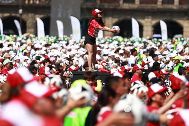 Mexico City attempts to break Guinness World Record for largest football lesson MEXICO CITY, MEXICO - MARCH 15: Participants take part in a football lesson during an attempt to break the Guinness World Record for the world s largest football (soccer) lesson, at Zocalo square, in Mexico City, Mexico on March 15, 2026. Thousands of people gathered to take part in the attempt to break the record in a soccer lesson organized by the Mexico City government as part of activities ahead of the 2026 FIFA World Cup. Daniel Cardenas Anadolu Mexico City Mexico. Editorial use only. Please get in touch for any other usage.  Copyright: x2026xAnadoluxDanielxCardenasx