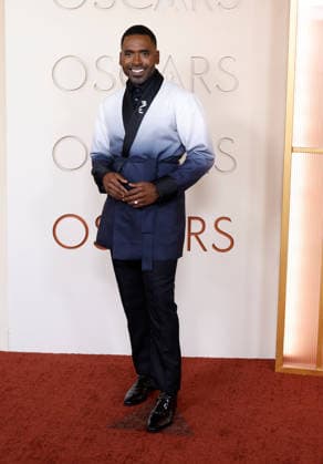 Justin Sylvester arrives on the red carpet for the 98th annual Academy Awards in the Hollywood section of Los Angeles on Sunday, March 15, 2026. Conan O Brien will host the Oscars for the second consecutive year.  LAP20260315453 JOHNxANGELILLO