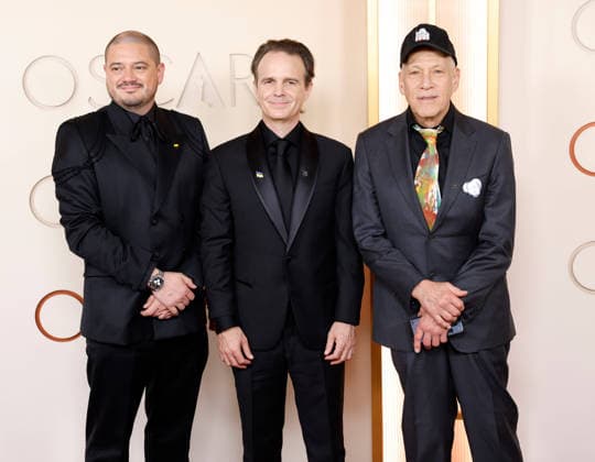 (L-R) Juan Arredondo, Craig Renaud and Jon Alpert arrive on the red carpet for the 98th annual Academy Awards in the Hollywood section of Los Angeles on Sunday, March 15, 2026. Conan O Brien will host the Oscars for the second consecutive year.  LAP20260315457 JOHNxANGELILLO