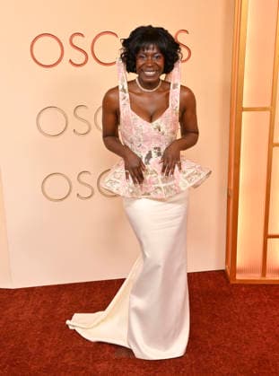 Isabél Zuaa arrives on the red carpet for the 98th annual Academy Awards in the Hollywood section of Los Angeles on Sunday, March 15, 2026. Conan O Brien will host the Oscars for the second consecutive year.  LAP20260315138 JIMxRUYMEN