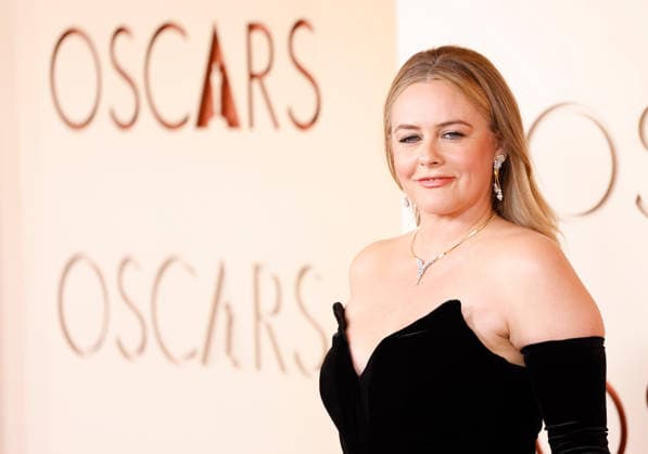 Alicia Silverstone arrives on the red carpet for the 98th annual Academy Awards in the Hollywood section of Los Angeles on Sunday, March 15, 2026. Conan O Brien will host the Oscars for the second consecutive year.  LAP20260315426 JOHNxANGELILLO