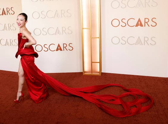 Li Jun Li arrives on the red carpet for the 98th annual Academy Awards in the Hollywood section of Los Angeles on Sunday, March 15, 2026. Conan O Brien will host the Oscars for the second consecutive year.  LAP20260315450 JOHNxANGELILLO