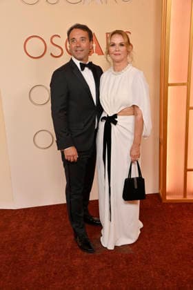 Nelson Ferreira and Martine Colette arrive on the red carpet for the 98th annual Academy Awards in the Hollywood section of Los Angeles on Sunday, March 15, 2026. Conan O Brien will host the Oscars for the second consecutive year.  LAP20260315123 JIMxRUYMEN