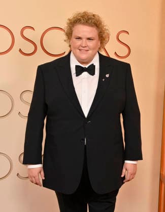 Fortune Feimster arrives on the red carpet for the 98th annual Academy Awards in the Hollywood section of Los Angeles on Sunday, March 15, 2026. Conan O Brien will host the Oscars for the second consecutive year.  LAP20260315124 JIMxRUYMEN