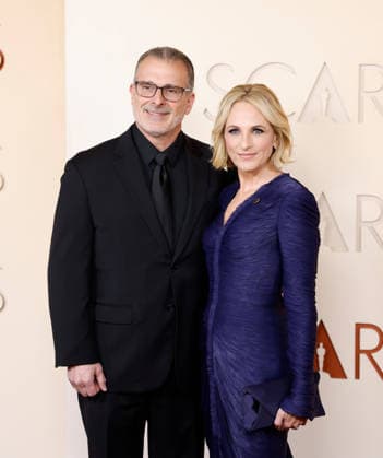 Marlee Matlin (R) and Kevin Grandalski arrive on the red carpet for the 98th annual Academy Awards in the Hollywood section of Los Angeles on Sunday, March 15, 2026. Conan O Brien will host the Oscars for the second consecutive year.  LAP20260315408 JOHNxANGELILLO