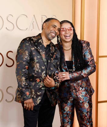 Larry Mitchell (L) and guest arrive on the red carpet for the 98th annual Academy Awards in the Hollywood section of Los Angeles on Sunday, March 15, 2026. Conan O Brien will host the Oscars for the second consecutive year.  LAP20260315422 JOHNxANGELILLO