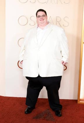 Greg Kwedar arrives on the red carpet for the 98th annual Academy Awards in the Hollywood section of Los Angeles on Sunday, March 15, 2026. Conan O Brien will host the Oscars for the second consecutive year.  LAP20260315423 JOHNxANGELILLO