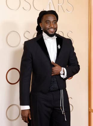 Shaboozey arrives on the red carpet for the 98th annual Academy Awards in the Hollywood section of Los Angeles on Sunday, March 15, 2026. Conan O Brien will host the Oscars for the second consecutive year.  LAP20260315435 JOHNxANGELILLO