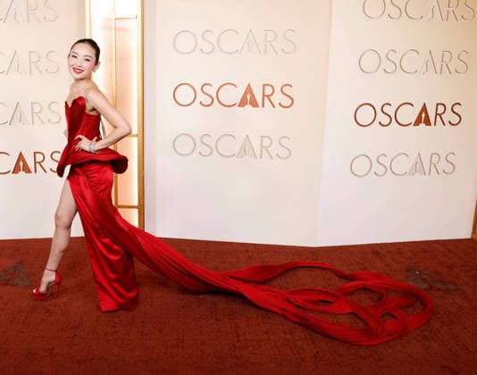 Li Jun Li arrives on the red carpet for the 98th annual Academy Awards in the Hollywood section of Los Angeles on Sunday, March 15, 2026. Conan O Brien will host the Oscars for the second consecutive year.  LAP20260315449 JOHNxANGELILLO