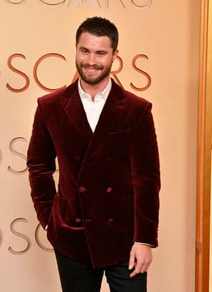 Chase Stokes arrives on the red carpet for the 98th annual Academy Awards in the Hollywood section of Los Angeles on Sunday, March 15, 2026. Conan O Brien will host the Oscars for the second consecutive year.  LAP20260315151 JIMxRUYMEN