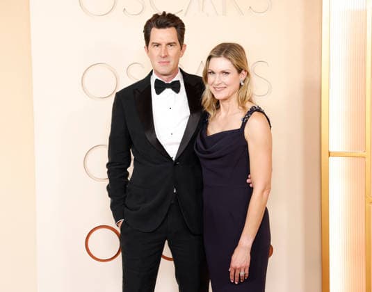 (L-R) Joseph Kosinski and Kristin Kosinski arrive on the red carpet for the 98th annual Academy Awards in the Hollywood section of Los Angeles on Sunday, March 15, 2026. Conan O Brien will host the Oscars for the second consecutive year.  LAP20260315500 JOHNxANGELILLO