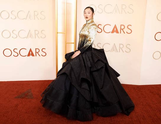 Audrey Nuna arrives on the red carpet for the 98th annual Academy Awards in the Hollywood section of Los Angeles on Sunday, March 15, 2026. Conan O Brien will host the Oscars for the second consecutive year.  LAP20260315504 JOHNxANGELILLO