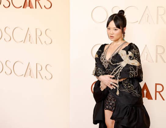 Rei Ami arrives on the red carpet for the 98th annual Academy Awards in the Hollywood section of Los Angeles on Sunday, March 15, 2026. Conan O Brien will host the Oscars for the second consecutive year.  LAP20260315509 JOHNxANGELILLO