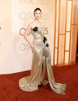 Ejae arrives on the red carpet for the 98th annual Academy Awards in the Hollywood section of Los Angeles on Sunday, March 15, 2026. Conan O Brien will host the Oscars for the second consecutive year.  LAP20260315510 JOHNxANGELILLO