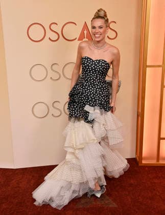 Thea Sofie Loch Næss arrives on the red carpet for the 98th annual Academy Awards in the Hollywood section of Los Angeles on Sunday, March 15, 2026. Conan O Brien will host the Oscars for the second consecutive year.  LAP20260315161 JIMxRUYMEN