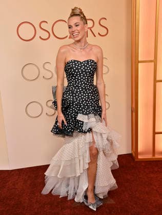 Thea Sofie Loch Næss arrives on the red carpet for the 98th annual Academy Awards in the Hollywood section of Los Angeles on Sunday, March 15, 2026. Conan O Brien will host the Oscars for the second consecutive year.  LAP20260315162 JIMxRUYMEN