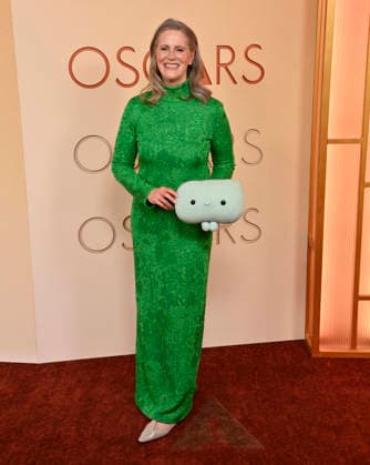 Mary Alice Drumm arrives on the red carpet for the 98th annual Academy Awards in the Hollywood section of Los Angeles on Sunday, March 15, 2026. Conan O Brien will host the Oscars for the second consecutive year.  LAP20260315163 JIMxRUYMEN