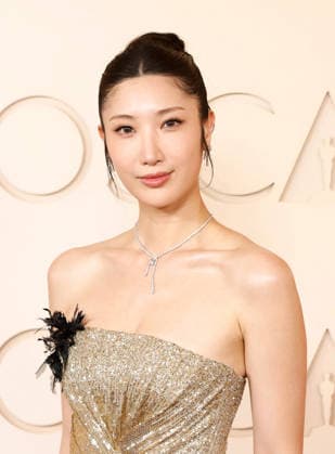 Ejae arrives on the red carpet for the 98th annual Academy Awards in the Hollywood section of Los Angeles on Sunday, March 15, 2026. Conan O Brien will host the Oscars for the second consecutive year.  LAP20260315514 JOHNxANGELILLO