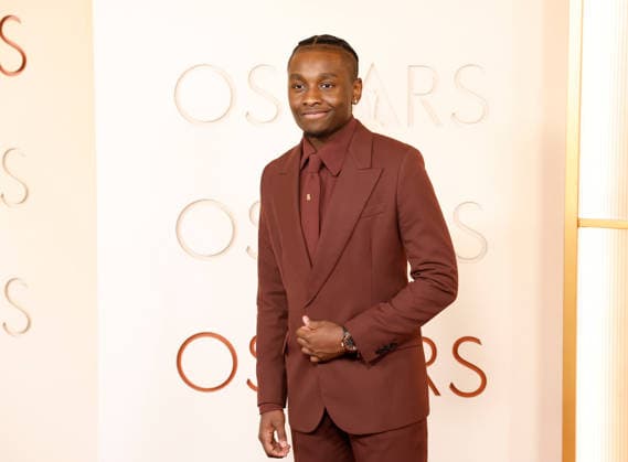 Miles Caton arrives on the red carpet for the 98th annual Academy Awards in the Hollywood section of Los Angeles on Sunday, March 15, 2026. Conan O Brien will host the Oscars for the second consecutive year.  LAP20260315515 JOHNxANGELILLO
