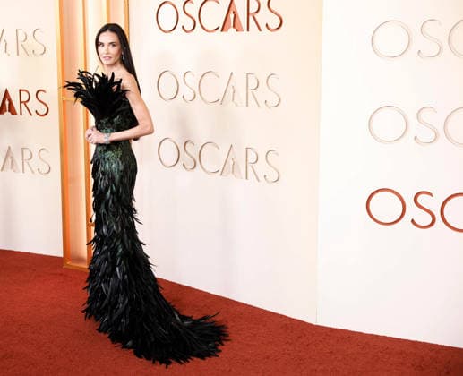 Demi Moore arrives on the red carpet for the 98th annual Academy Awards in the Hollywood section of Los Angeles on Sunday, March 15, 2026. Conan O Brien will host the Oscars for the second consecutive year.  LAP20260315551 JOHNxANGELILLO
