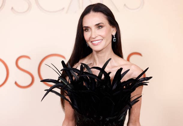 Demi Moore arrives on the red carpet for the 98th annual Academy Awards in the Hollywood section of Los Angeles on Sunday, March 15, 2026. Conan O Brien will host the Oscars for the second consecutive year.  LAP20260315554 JOHNxANGELILLO