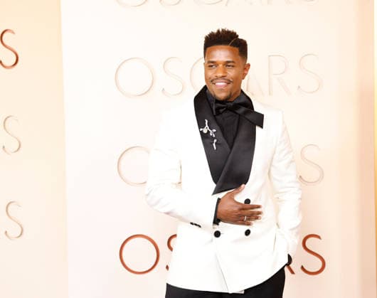 Jeremy Pope arrives on the red carpet for the 98th annual Academy Awards in the Hollywood section of Los Angeles on Sunday, March 15, 2026. Conan O Brien will host the Oscars for the second consecutive year.  LAP20260315562 JOHNxANGELILLO
