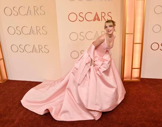 Mckenna Grace arrives on the red carpet for the 98th annual Academy Awards in the Hollywood section of Los Angeles on Sunday, March 15, 2026. Conan O Brien will host the Oscars for the second consecutive year.  LAP20260315172 JIMxRUYMEN
