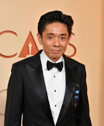 Kazu Hiro arrives on the red carpet for the 98th annual Academy Awards in the Hollywood section of Los Angeles on Sunday, March 15, 2026. Conan O Brien will host the Oscars for the second consecutive year.  LAP20260315179 JIMxRUYMEN