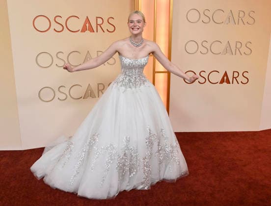 Elle Fanning arrives on the red carpet for the 98th annual Academy Awards in the Hollywood section of Los Angeles on Sunday, March 15, 2026. Conan O Brien will host the Oscars for the second consecutive year.  LAP20260315187 JIMxRUYMEN