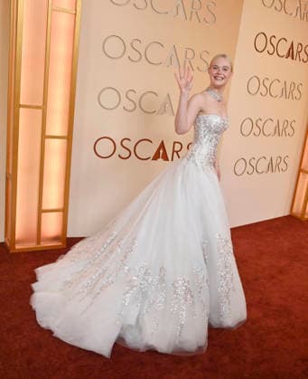 Elle Fanning arrives on the red carpet for the 98th annual Academy Awards in the Hollywood section of Los Angeles on Sunday, March 15, 2026. Conan O Brien will host the Oscars for the second consecutive year.  LAP20260315192 JIMxRUYMEN