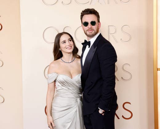 (L-R) Alba Baptista and Chris Evans attend the 98th Oscars on the red carpet for the 98th annual Academy Awards in the Hollywood section of Los Angeles on Sunday, March 15, 2026. Conan O Brien will host the Oscars for the second consecutive year.  LAP20260315664 JOHNxANGELILLO