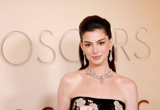 Anne Hathaway attends the 98th Oscars on the red carpet for the 98th annual Academy Awards in the Hollywood section of Los Angeles on Sunday, March 15, 2026. Conan O Brien will host the Oscars for the second consecutive year.  LAP20260315668 JOHNxANGELILLO