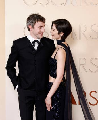 Paul Mescal and Gracie Abrams attend the 98th Oscars arrive on the red carpet for the 98th annual Academy Awards in the Hollywood section of Los Angeles on Sunday, March 15, 2026. Conan O Brien will host the Oscars for the second consecutive year.  LAP20260315623 JOHNxANGELILLO