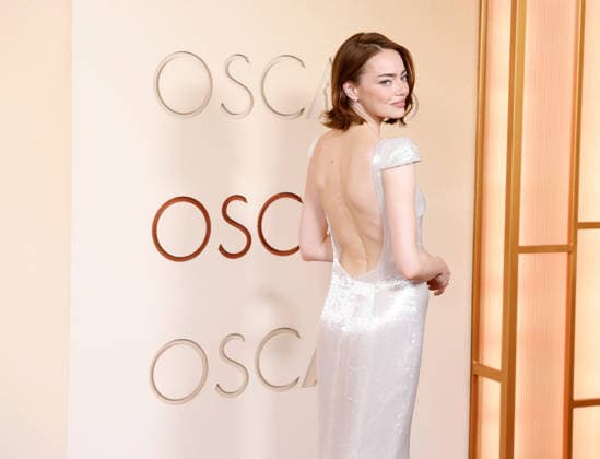 Emma Stone attends the 98th Oscars on the red carpet for the 98th annual Academy Awards in the Hollywood section of Los Angeles on Sunday, March 15, 2026. Conan O Brien will host the Oscars for the second consecutive year.  LAP20260315640 JOHNxANGELILLO