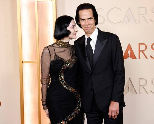 (L-R) Susie Cave and Nick Cave attend the 98th Oscars on the red carpet for the 98th annual Academy Awards in the Hollywood section of Los Angeles on Sunday, March 15, 2026. Conan O Brien will host the Oscars for the second consecutive year.  LAP20260315647 JOHNxANGELILLO