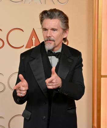 Ethan Hawke arrives on the red carpet for the 98th annual Academy Awards in the Hollywood section of Los Angeles on Sunday, March 15, 2026. Conan O Brien will host the Oscars for the second consecutive year.  LAP20260315238 JIMxRUYMEN