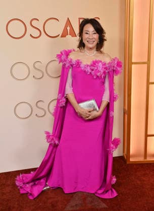 Janet Yang arrives on the red carpet for the 98th annual Academy Awards in the Hollywood section of Los Angeles on Sunday, March 15, 2026. Conan O Brien will host the Oscars for the second consecutive year.  LAP20260315260 JIMxRUYMEN