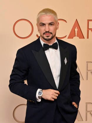 Gabriel Leone arrives on the red carpet for the 98th annual Academy Awards in the Hollywood section of Los Angeles on Sunday, March 15, 2026. Conan O Brien will host the Oscars for the second consecutive year.  LAP20260315275 JIMxRUYMEN