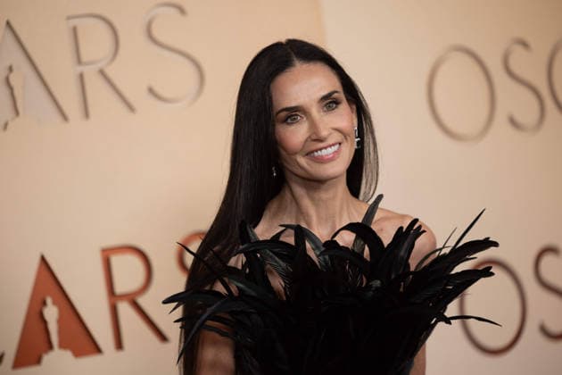 Demi Moore arrives on the red carpet of the 98th OscarsÂ® at the DolbyÂ® Theatre at Ovation Hollywood on Sunday, March 15, 2026. Los Angeles CA USA  35008464PLX