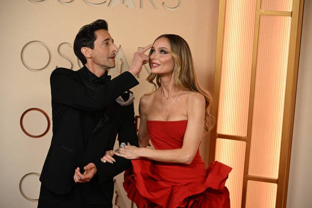 March 15, 2026, Los Angeles, California, USA: ADRIEN BRODY and GEORGINA CHAPMAN during red carpet arrivals for the 98th Academy Awards, presented by the Academy of Motion Picture Arts and Sciences (AMPAS), at the Dolby Theatre in Hollywood. Los Angeles USA  - ZUMAz03_ 20260315_abp_z03_102 Copyright: xKevinxSullivanx