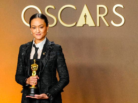 Autumn Durald Arkapaw celebrates in the press photo room after winning the Best Cinematography Oscar for Sinners during the 98th annual Academy Awards in the Hollywood section of Los Angeles on Sunday, March 15, 2026.  LAP20260315389 BONNIExCASH