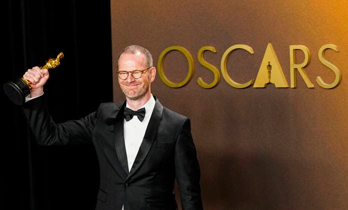 Joachim Trier celebrates in the press photo room after winning the Best International Feature Film Oscar for Sentimental Value-Norway during the 98th annual Academy Awards in the Hollywood section of Los Angeles on Sunday, March 15, 2026.  LAP20260315398 BONNIExCASH