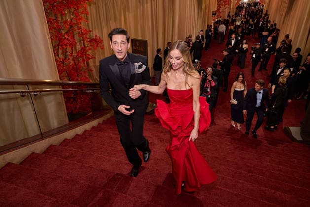 Adrien Brody and Georgina Chapman arrive on the red carpet of the 98th OscarsÂ® at the DolbyÂ® Theatre at Ovation Hollywood on Sunday, March 15, 2026. Los Angeles CA USA  350081136PLX